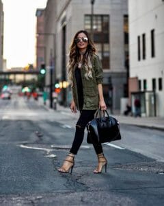 Dark-hued Jacket and a Medium-sized Duffel bag